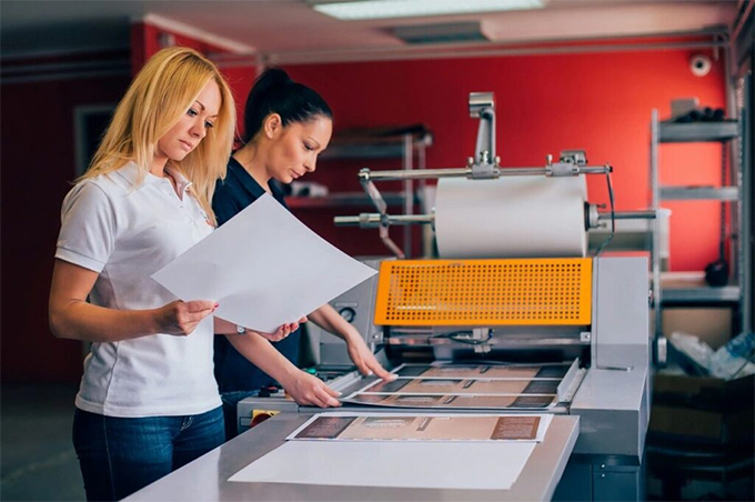 Production team checking proofs